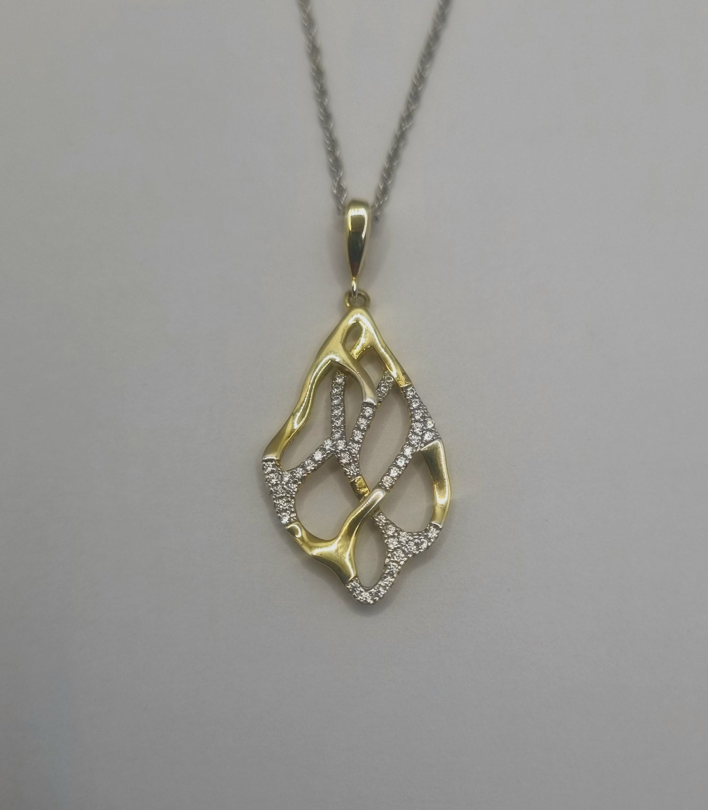 Paul Costelloe Sterling silver pendant, crystal & rose weaved drop